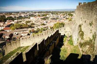a view of a city from the wall of a castle at DOMITYS - Carmina in Carcassonne