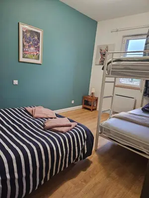 a bedroom with a bunk bed and a ladder at Domaine Saint Augustin in Rieux-Minervois