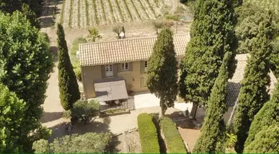an aerial view of a house with trees at Bergerie de L'horte in Tourouzelle