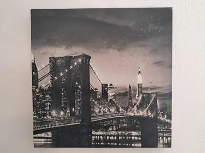 a black and white photo of a bridge in the city at le duplex charmant et cosy in Narbonne