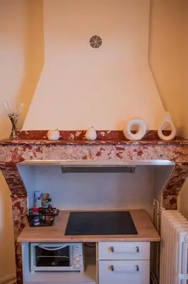 a kitchen with a sink and a counter top at Carcassonne spirit in Carcassonne