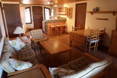 a living room with a couch and a table at Alzina in Vingrau