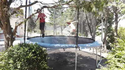 two people standing on top of a trampoline at Alzina in Vingrau