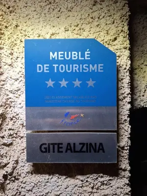 a blue sign that says melville de toumontime at Alzina in Vingrau