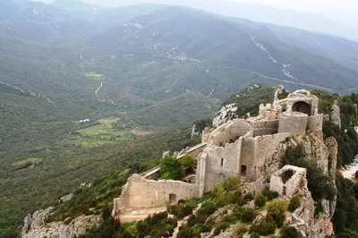an old building on the side of a mountain at Gite la Bonté, chaleureux avec une vue enchantée in Vélieux