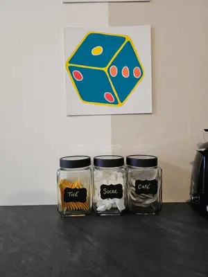 a table with three jars of food on it at POP ART Casino vibe! in Gruissan