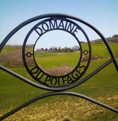 a sign that says doomsday on top of a gate at Argein in Villautou
