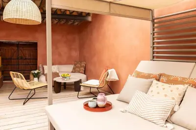 a living room with a white couch and chairs at Maison Zellige - Rooftop - Gruissan Center in Gruissan