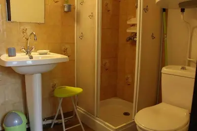 a bathroom with a shower and a sink and a toilet at Maison 3 pièces 6 couchages PORT LA NOUVELLE PN340-040 in Port-la-Nouvelle