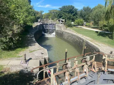a lock on a canal in a park at Ferrabouc in Mas-Saintes-Puelles