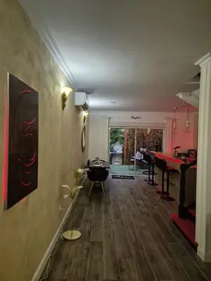 a bedroom with a large bed and a bath tub at Shiny Cloud Love Room in Limoux