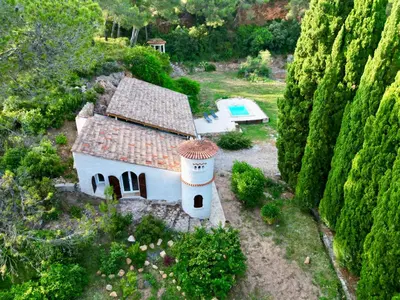 an aerial view of a house and a swimming pool at Architect's house Cleopatra luxury , private pool in heart of nature for 2 people in Quarante