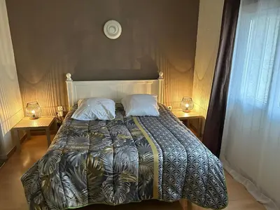 a bedroom with a bed with two pillows on it at Vistetta in Narbonne