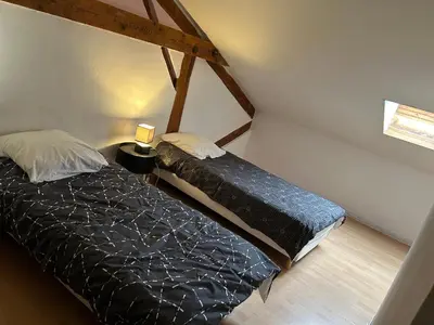 a bedroom with two beds in a room at Vistetta in Narbonne