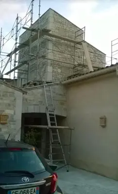a building being constructed with scaffolding on top of it at Hernesto in Carcassonne