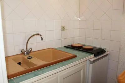 a kitchen with a sink and a counter top at Appartement Studio Cabine - Gruissan GN110-C13 in Gruissan