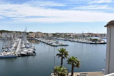 a group of boats docked in a harbor at Appartement évasion sur le port de Gruissan - GN380-C67 in Gruissan