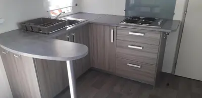 a kitchen with a sink and a counter top at omer port la nouvelle in Port-la-Nouvelle