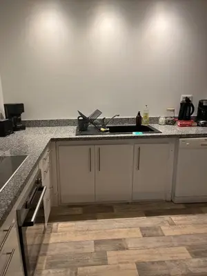 a kitchen with a sink and a counter top at Maison de Village in Lacrouzette