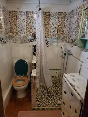 a bathroom with a toilet and a sink at La Concha 1 in Conques-sur-Orbiel
