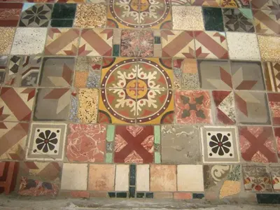 a tiled floor with different colored tiles on it at Maison de Maitre Comfortable holiday residence in Ferrals-lès-Corbières
