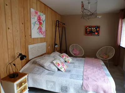a bedroom with a bed with pillows on it at le Relais de la Cavayere in Carcassonne