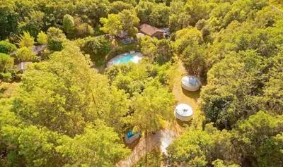 an aerial view of a backyard with a pool at Camping 2 étoiles - Piscine - ccb0hef in Fenouillet
