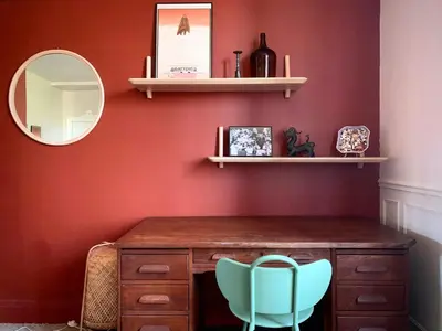 a dressing room with a mirror and a wooden dresser at 19Th Century Mansion With Pool Near Castres in Payrin-Augmontel
