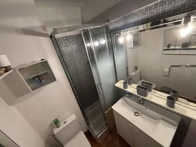 a bathroom with a shower and a toilet and a sink at Appart 2 pièces Cabine PORT LA NOUVELLE PN590-022 in Port-la-Nouvelle
