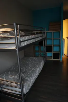 a room with two bunk beds in a room at Centre International de Séjour - MJC in Lézignan-Corbières