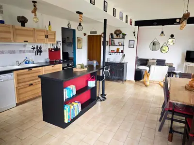 a collage of photos of a kitchen and a room at Terrasse, vue & Parking - Carnaval à pied in Limoux