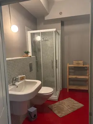 a bathroom with a toilet and a sink and a shower at O'MAZETTE CHAMBRE D'HOTE ROMANTIQUE visite de l'aude in Fabrezan