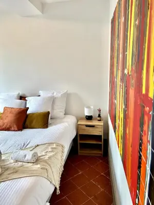 two beds sitting next to each other in a room at The62 in Carcassonne