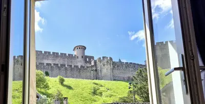 a view of a castle from a window at Face à la cité, Terrasse Et Climatisation - AE in Carcassonne