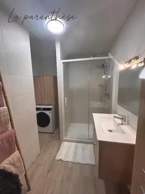 a bathroom with a shower and a sink at La parenthèse in Pamiers