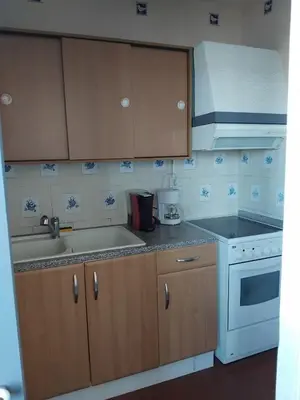 a kitchen with a sink and a stove at STUDIO Bis - PLAGE in Port-la-Nouvelle