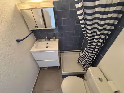 a small bathroom with a toilet and a sink at Appartement Studio-Cabine PORT-LA NOUVELLE PN290-074 in Port-la-Nouvelle