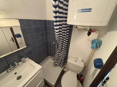 a small bathroom with a toilet and a sink at Appartement Studio-Cabine PORT-LA NOUVELLE PN290-074 in Port-la-Nouvelle