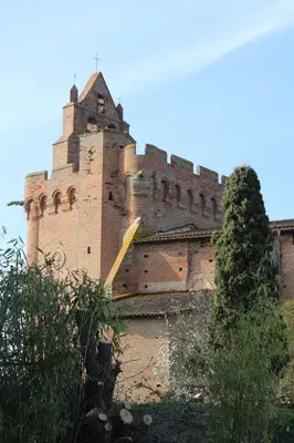 an old building with a tower on top of it at Escapade à Nailloux in Nailloux