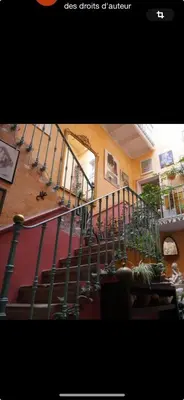 an image of a staircase in a building at Appartement au cœur de Mirepoix in Mirepoix
