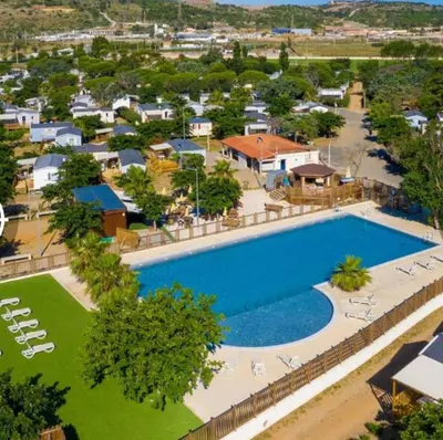 an overhead view of a swimming pool in a resort at Mobil Home 014 climatisé -camping Novela-3Ch in Port-la-Nouvelle