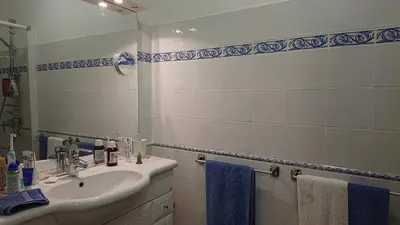 a bathroom with a sink and a mirror at Avalon in Caunes-Minervois
