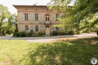 an old stone house with a large yard at Chateau sud in Cessales