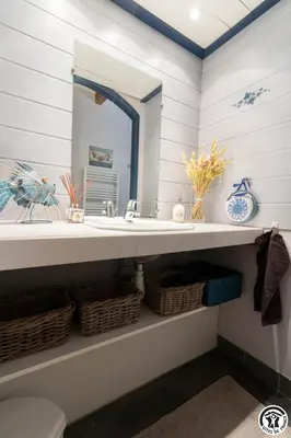 a bathroom with a sink and a mirror at Gîte Domaine de la Fée de l'Eau – L'Eau d'Ô in Saint-Félix-Lauragais