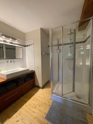 a bathroom with a glass shower and a sink at Maison Standing - Exceptionnel in Roquefort-des-Corbières