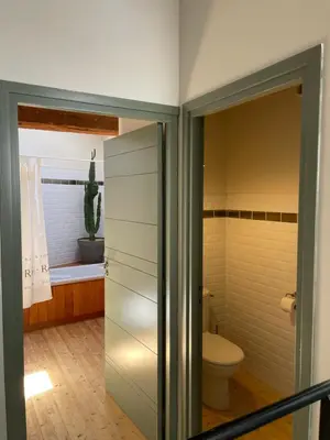a bathroom with a toilet and a shower at Maison Standing - Exceptionnel in Roquefort-des-Corbières