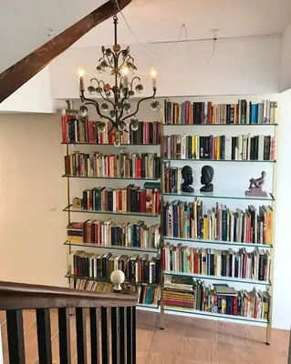 a book shelf filled with lots of books at Character House Between Toulouse And Carcassonne in Soupex