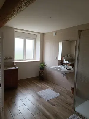 a bathroom with a sink and a mirror at Domaine Puy Saint Jammes in Castres