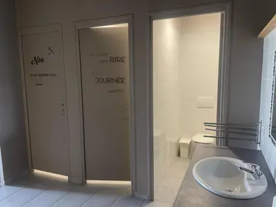 a bathroom with a sink and a toilet at Dortoir de 12Lits in Mas-Saintes-Puelles