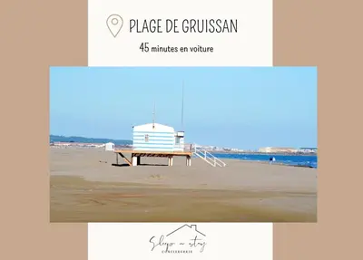 a picture of a beach with a bench and a lighthouse at La terrasse du Canal, appartement pour 5 personnes in La Redorte